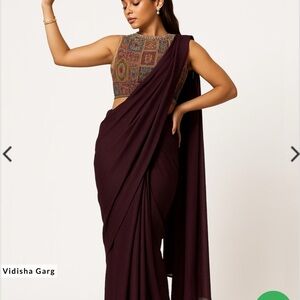 Elegant Maroon Sari with Patterned Blouse